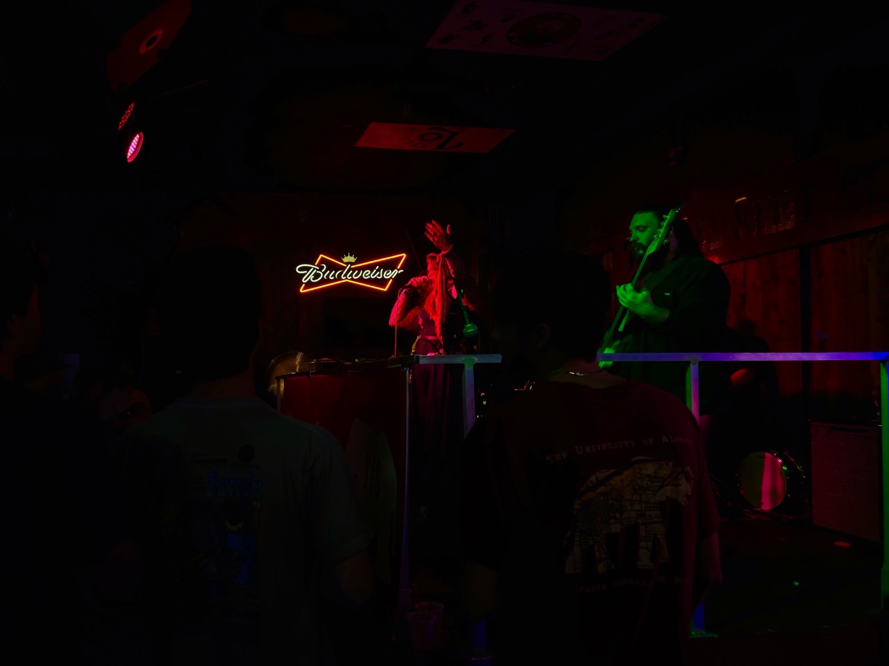 Something Like Mercury performing for a crowded music venue